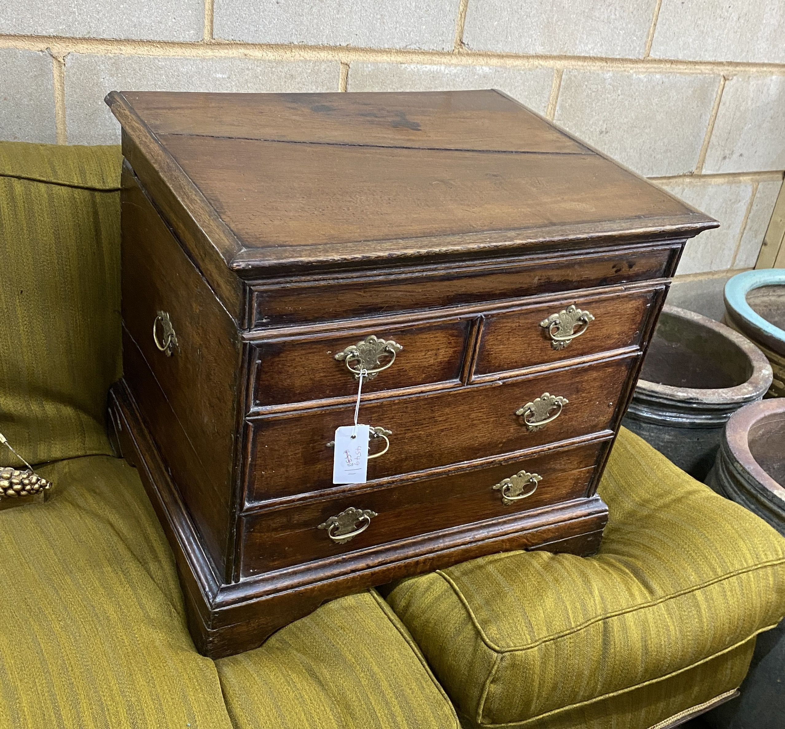 A 19th century oak box commode with dummy drawer front, width 56cm, depth 45cm, height 49cm